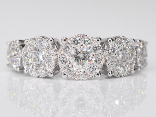 Witgouden rijring met 5 diamanten entourages 1.00 carat