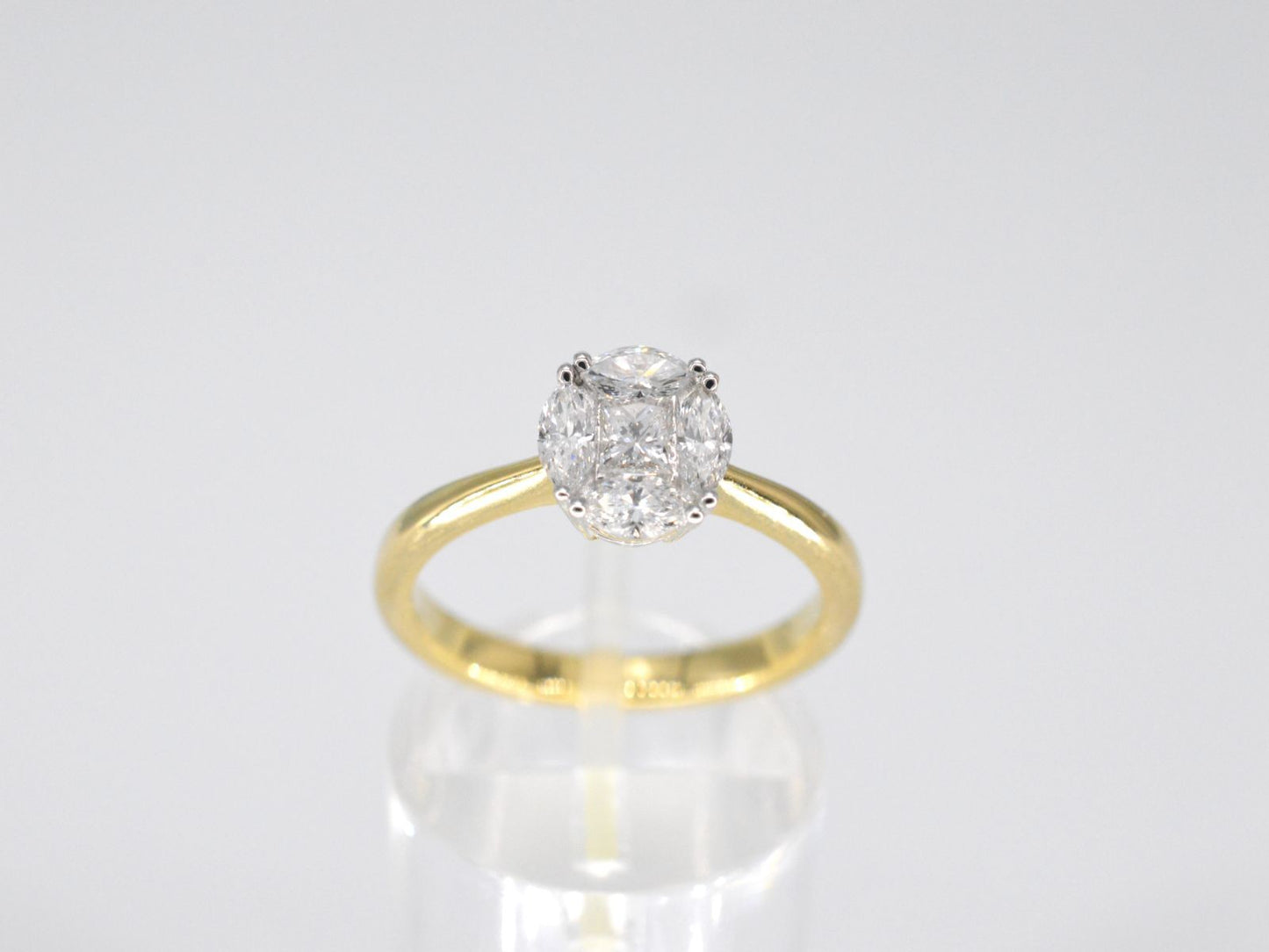 Gold ring with princess and marquise cut natural diamonds