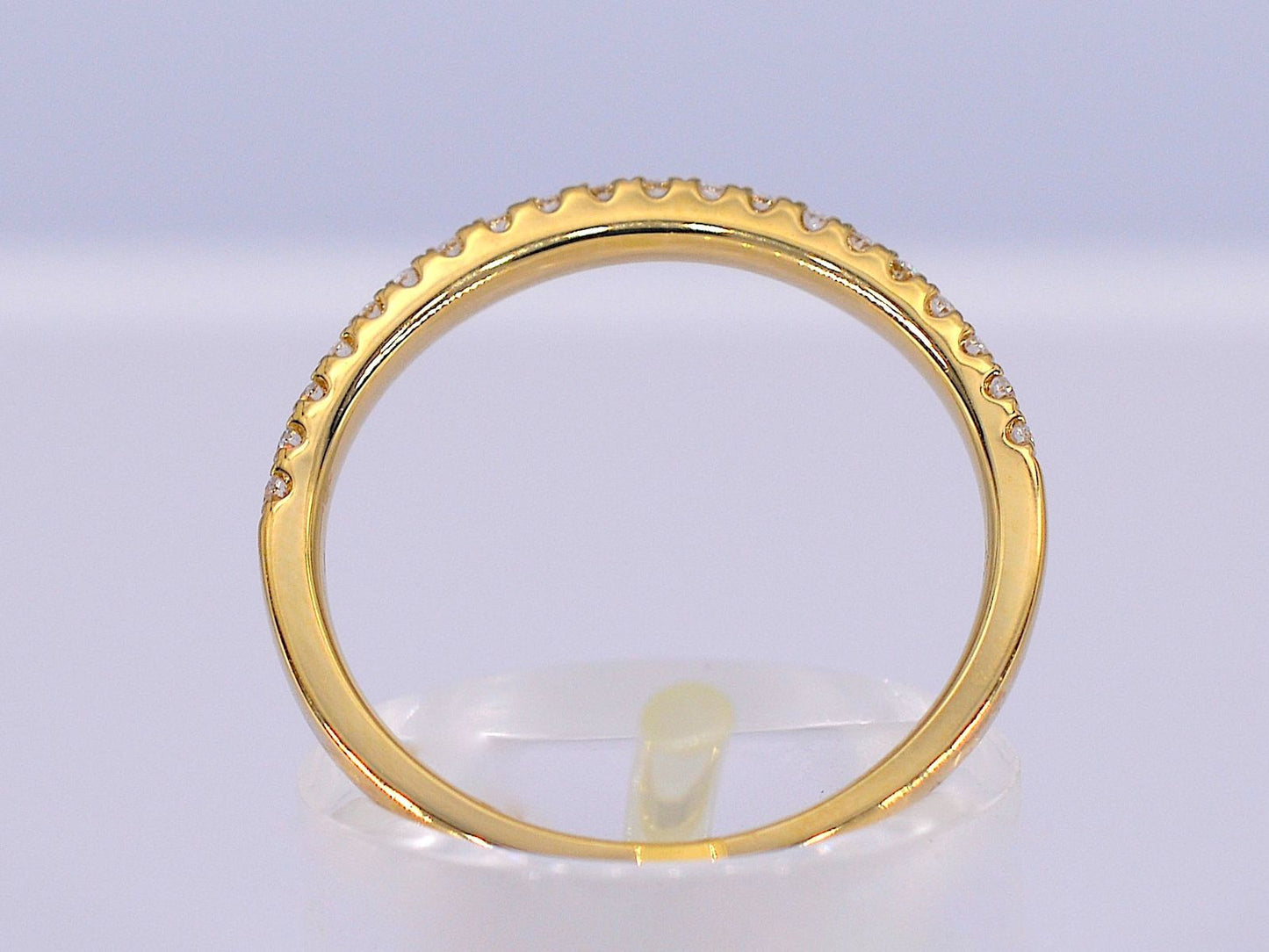 Gouden rijring met briljant geslepen diamant