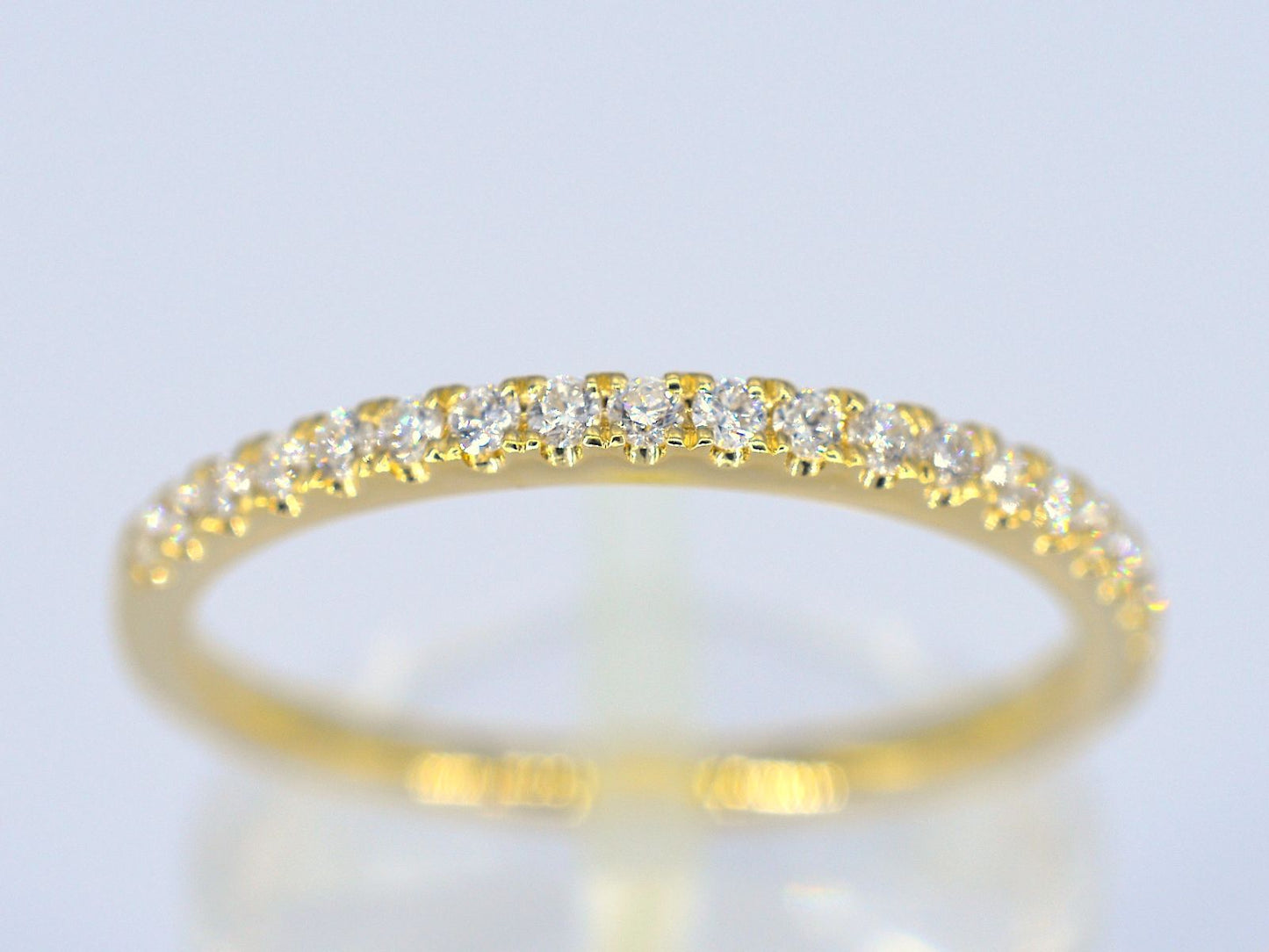 Gouden rijring met briljant geslepen diamant