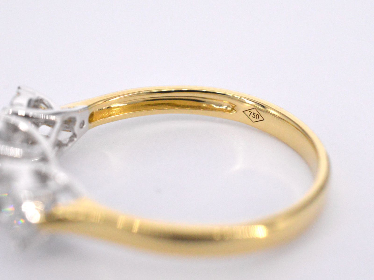 Gouden ring met drie chatons van diamanten 0.75 carat