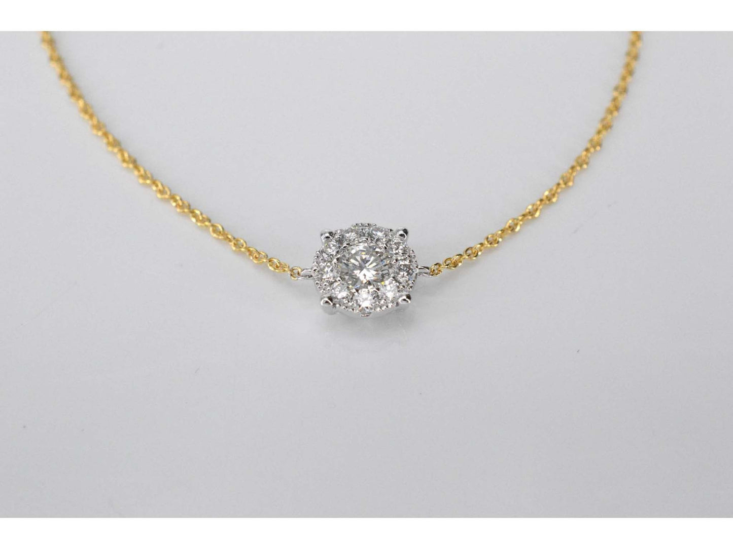 Gouden armband met een diamanten bedel
