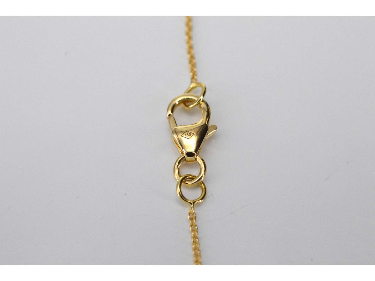 Gouden armband met een diamanten bedel