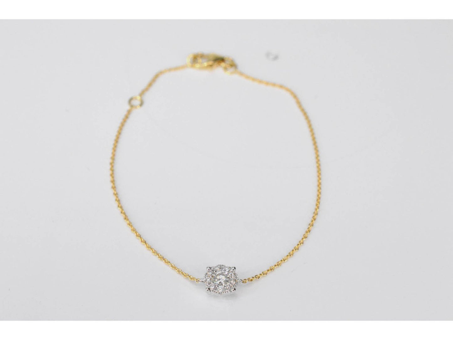 Gouden armband met een diamanten bedel