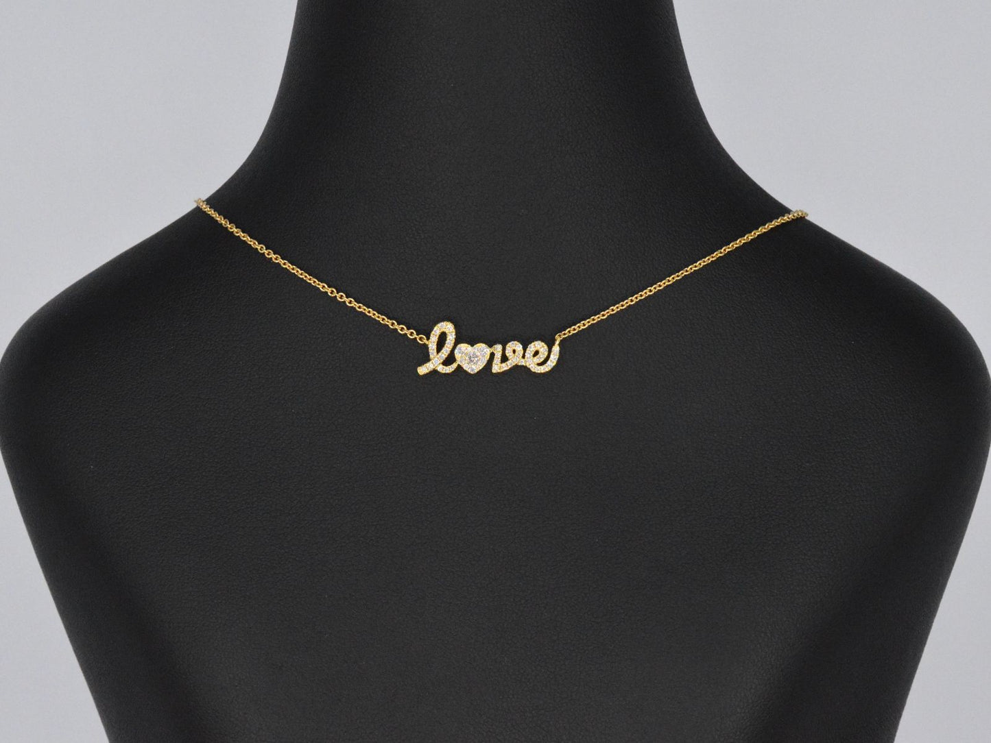 Gouden 'love' collier met diamanten