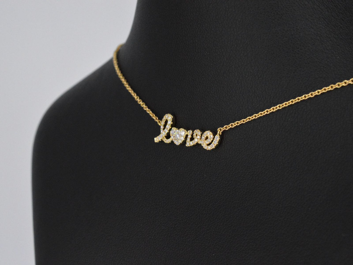 Gouden 'love' collier met diamanten