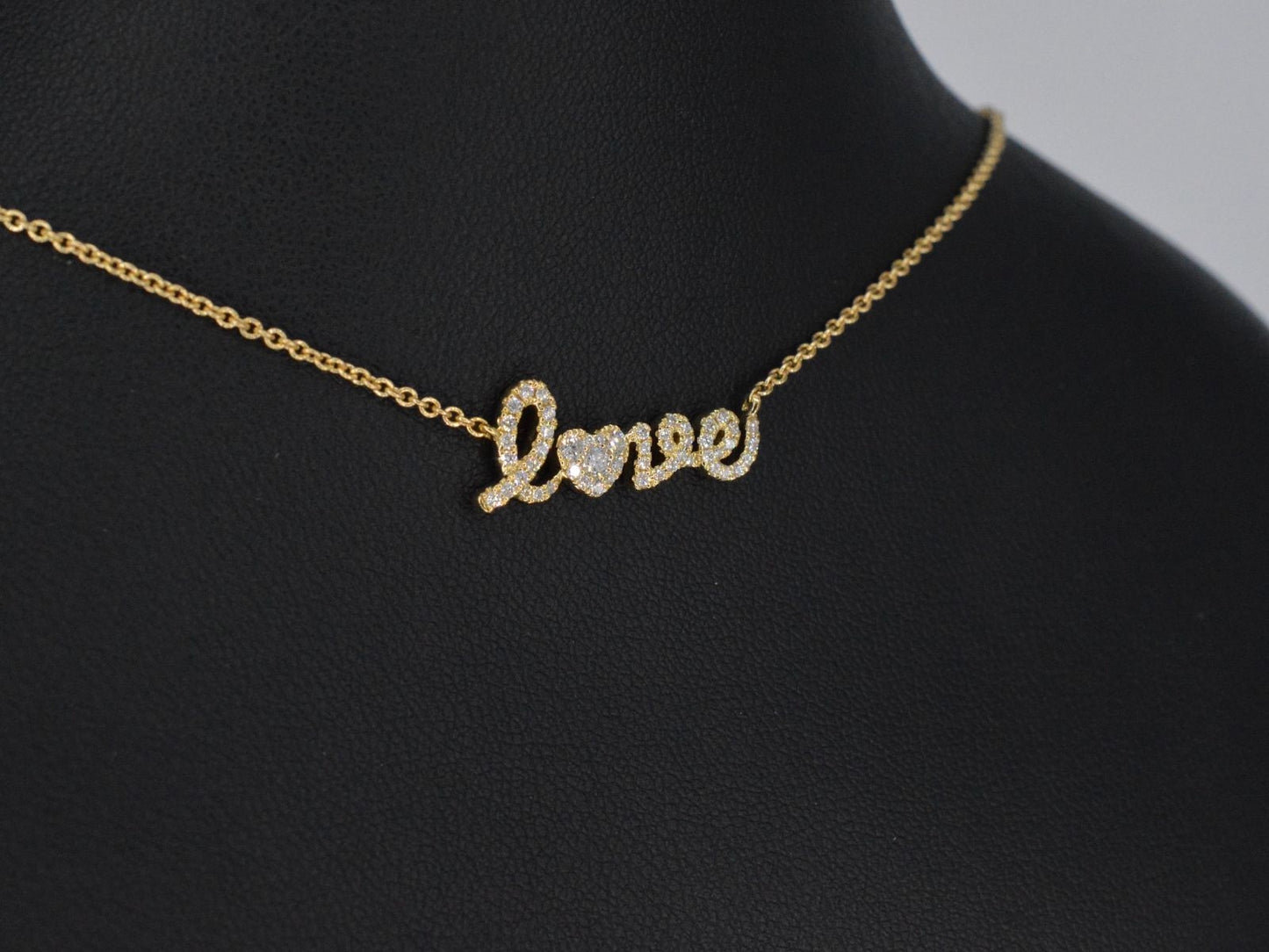 Gouden 'love' collier met diamanten