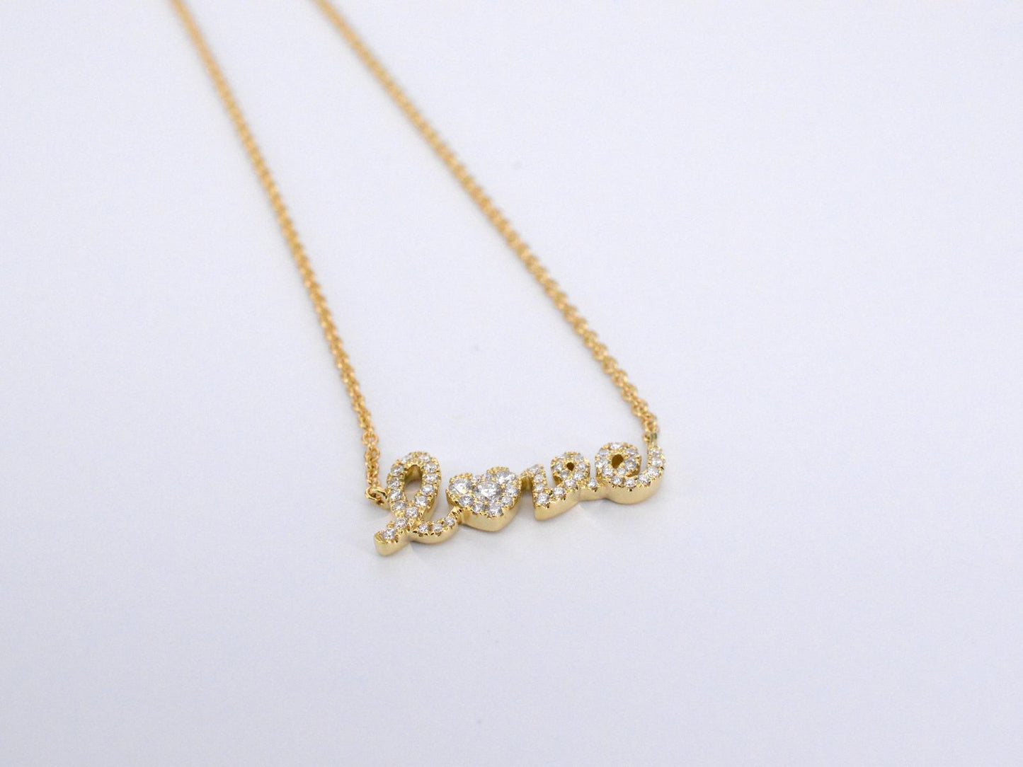 Gouden 'love' collier met diamanten