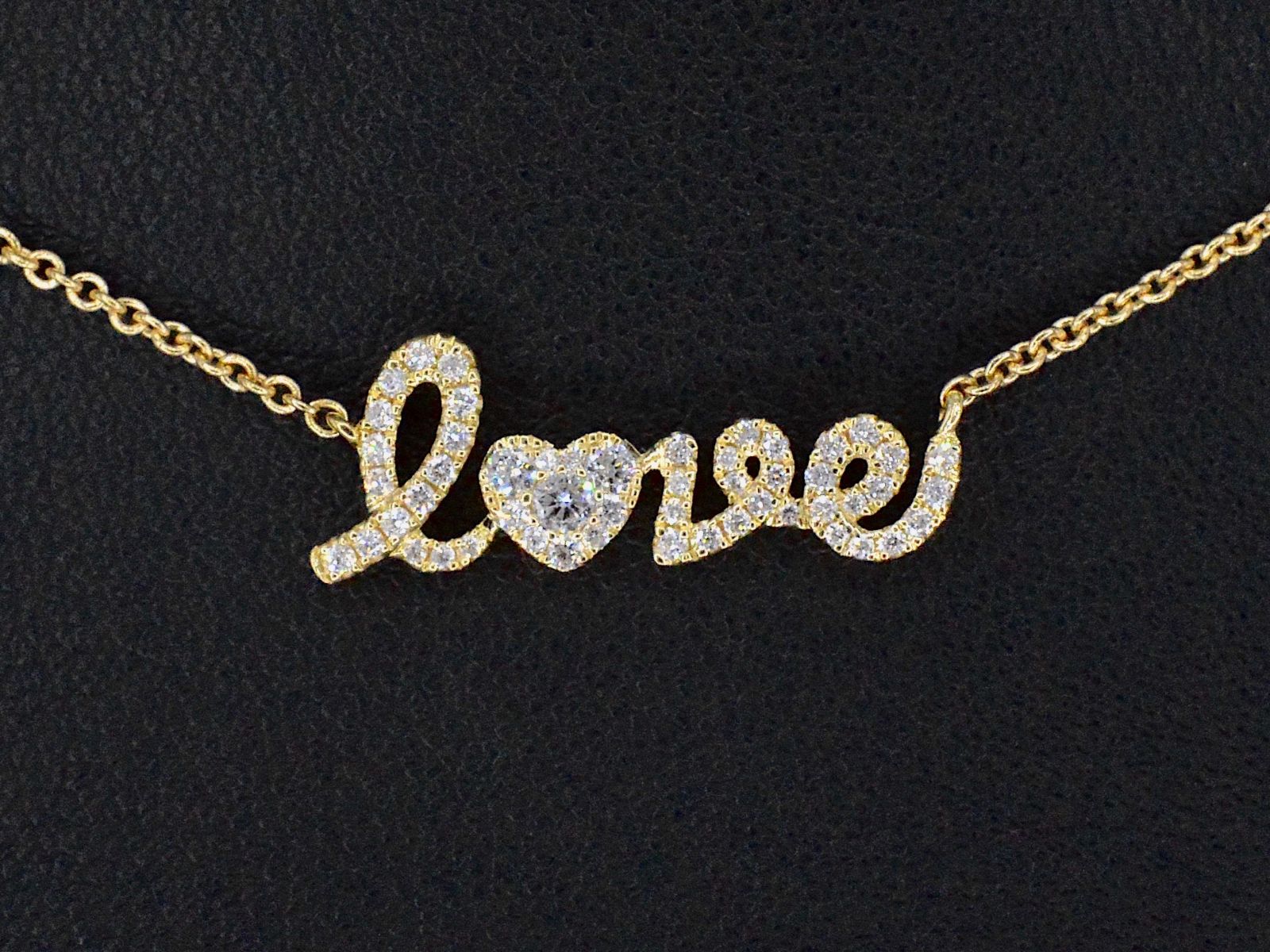 Gouden 'love' collier met diamanten