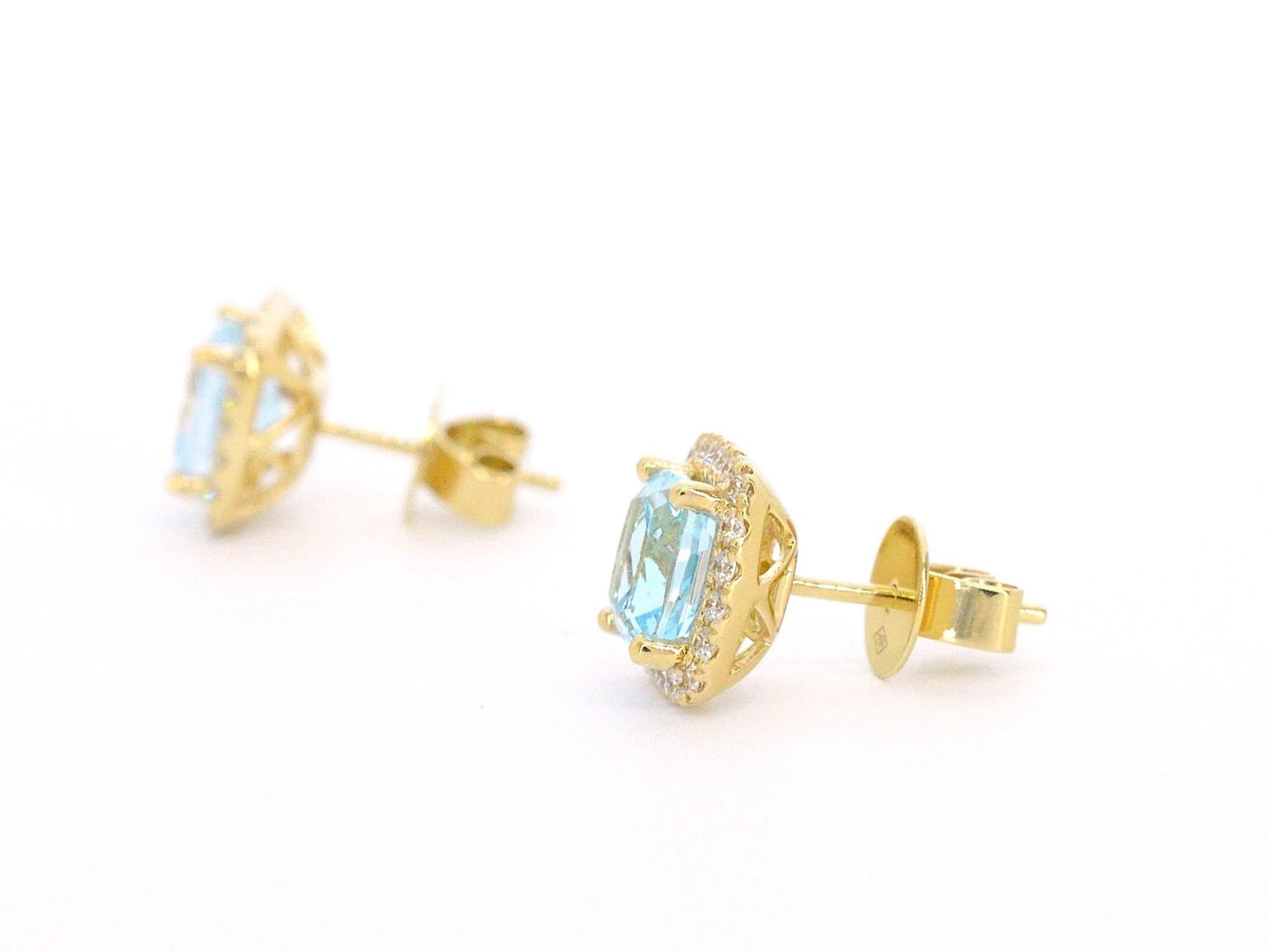 Gouden entourage oorbellen met grote topazen en diamanten