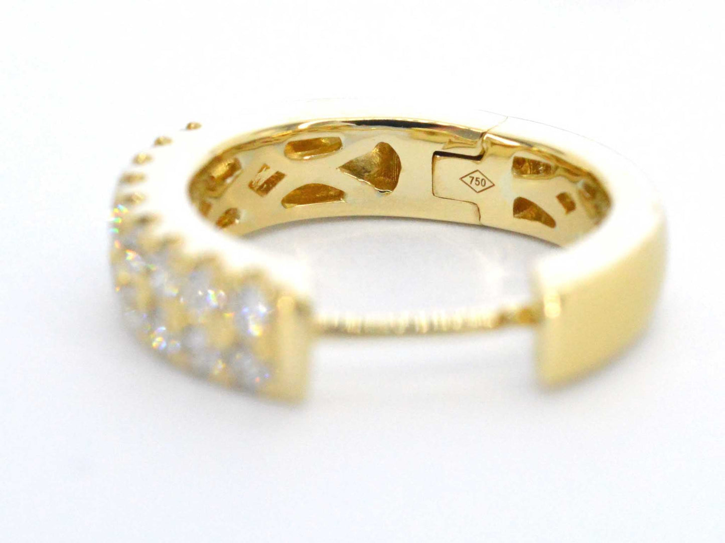 Gold hoop earrings with two rows of diamonds