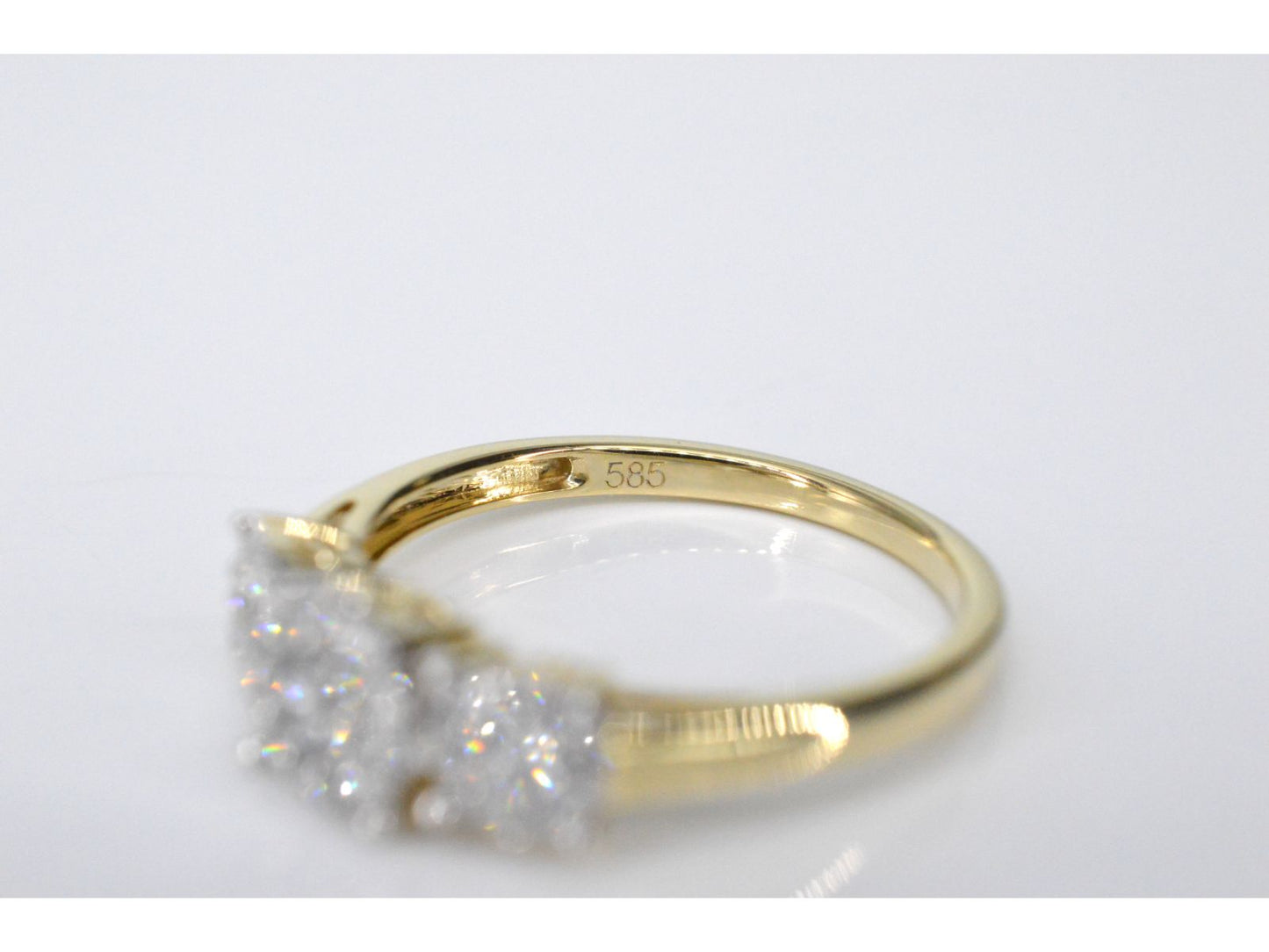 Gouden trinity ring met diamanten