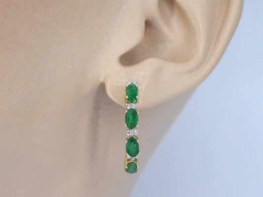 Gouden oorbellen met diamanten en smaragd