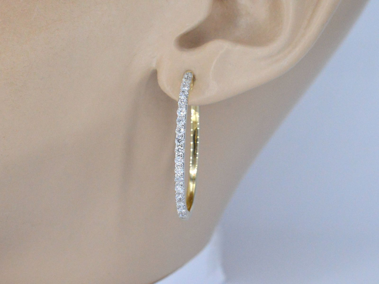Gouden creolen oorbellen met diamanten