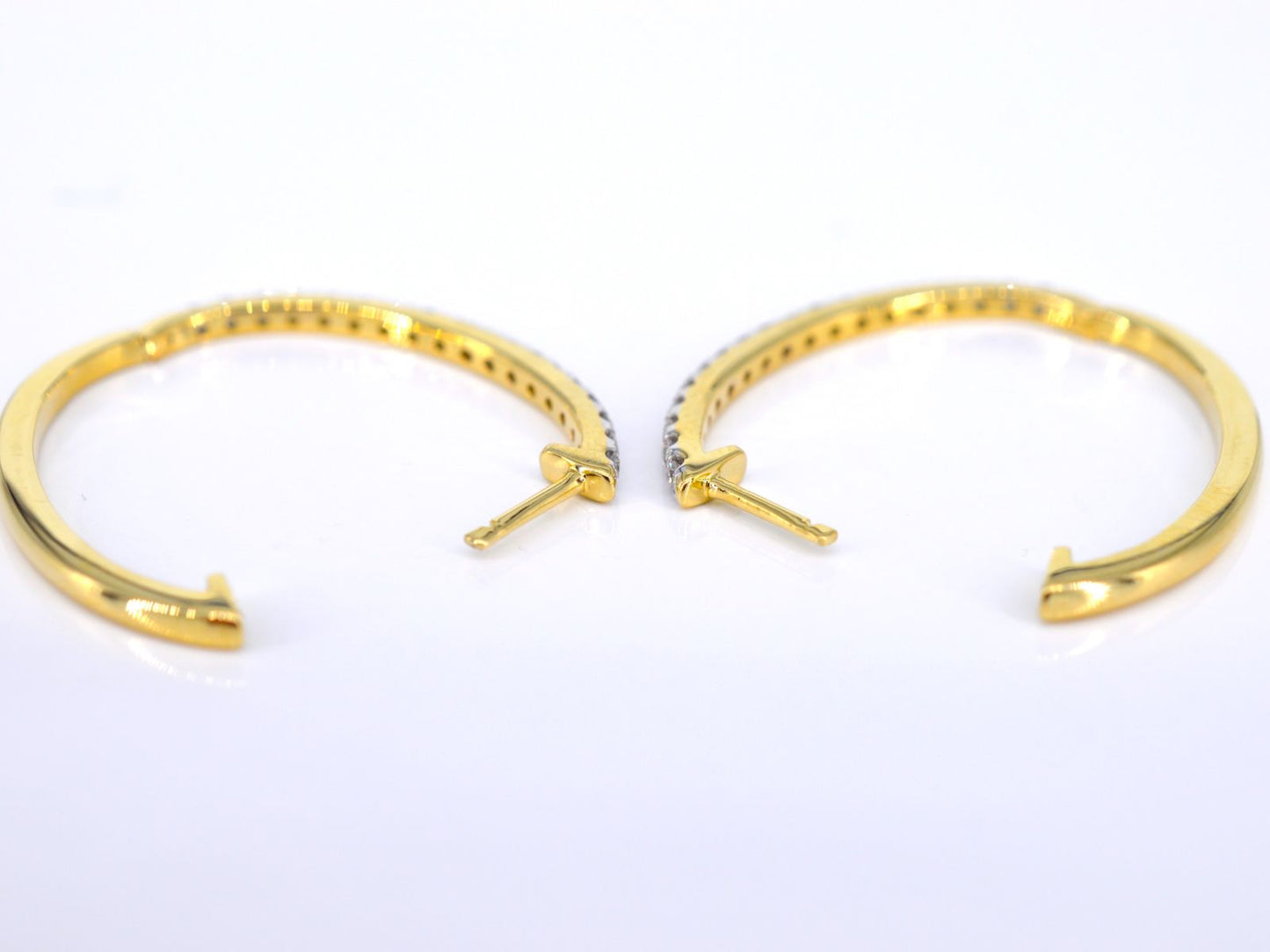 Gouden creolen oorbellen met diamanten