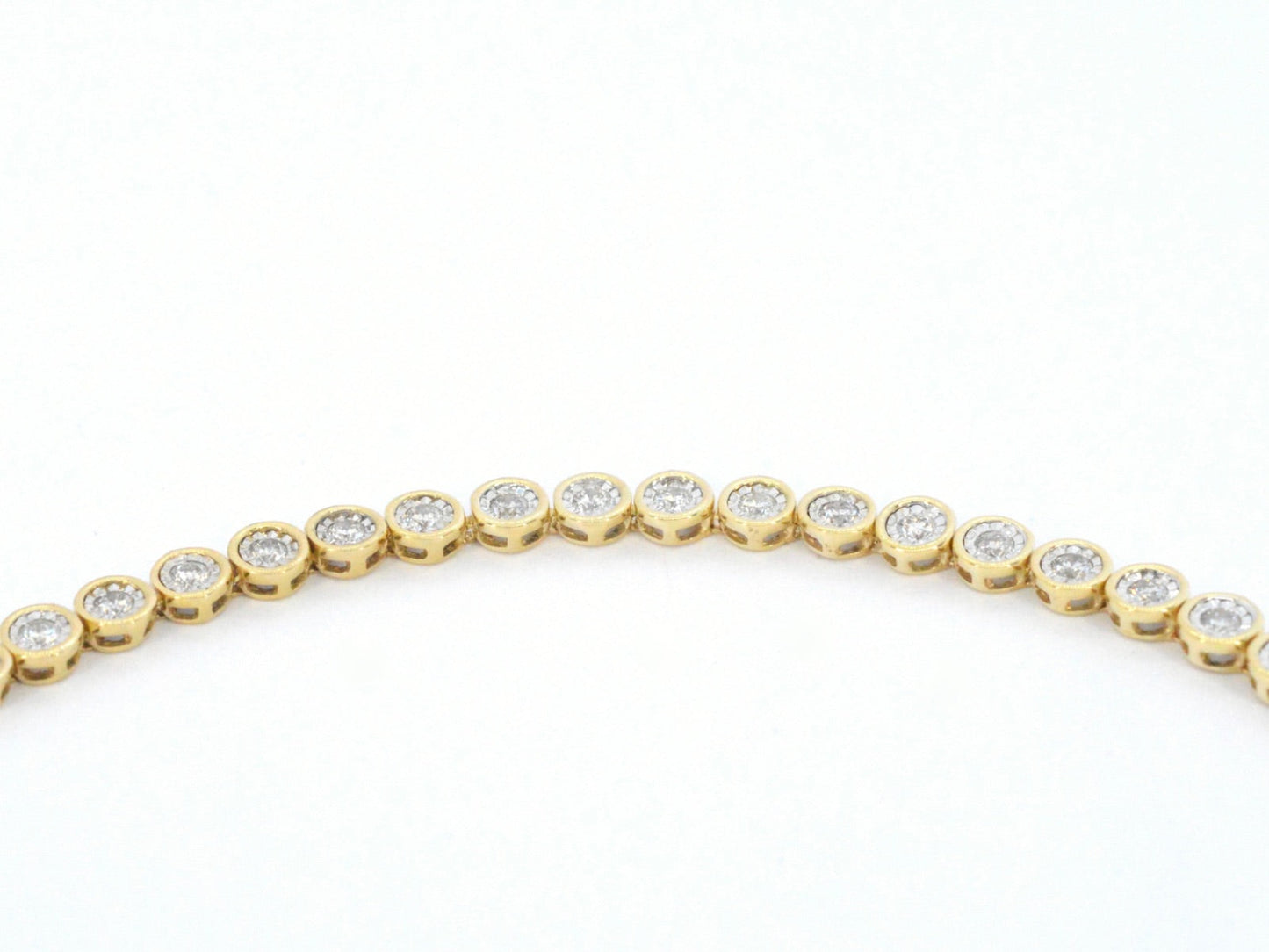 Gouden armband vol met diamanten gezet