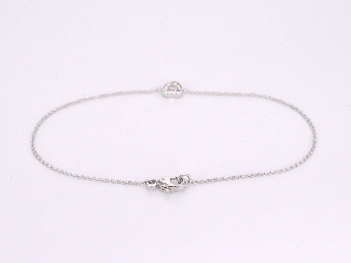 Witgouden armband met diamanten hartje 0.10 carat