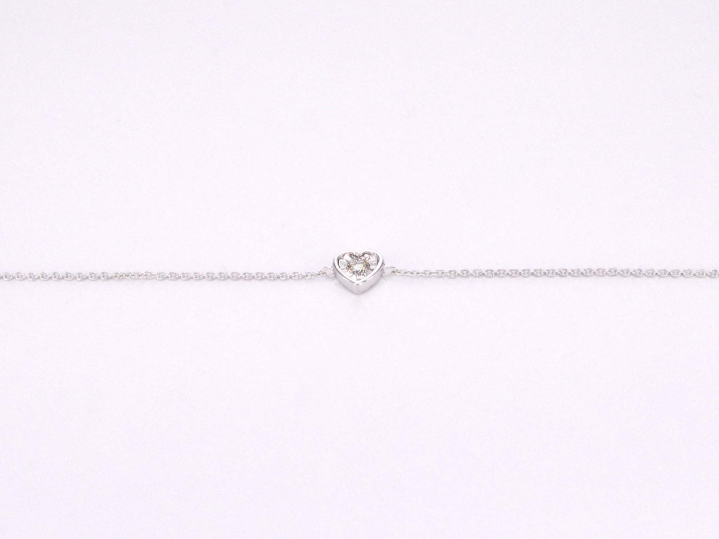 Witgouden armband met diamanten hartje 0.10 carat