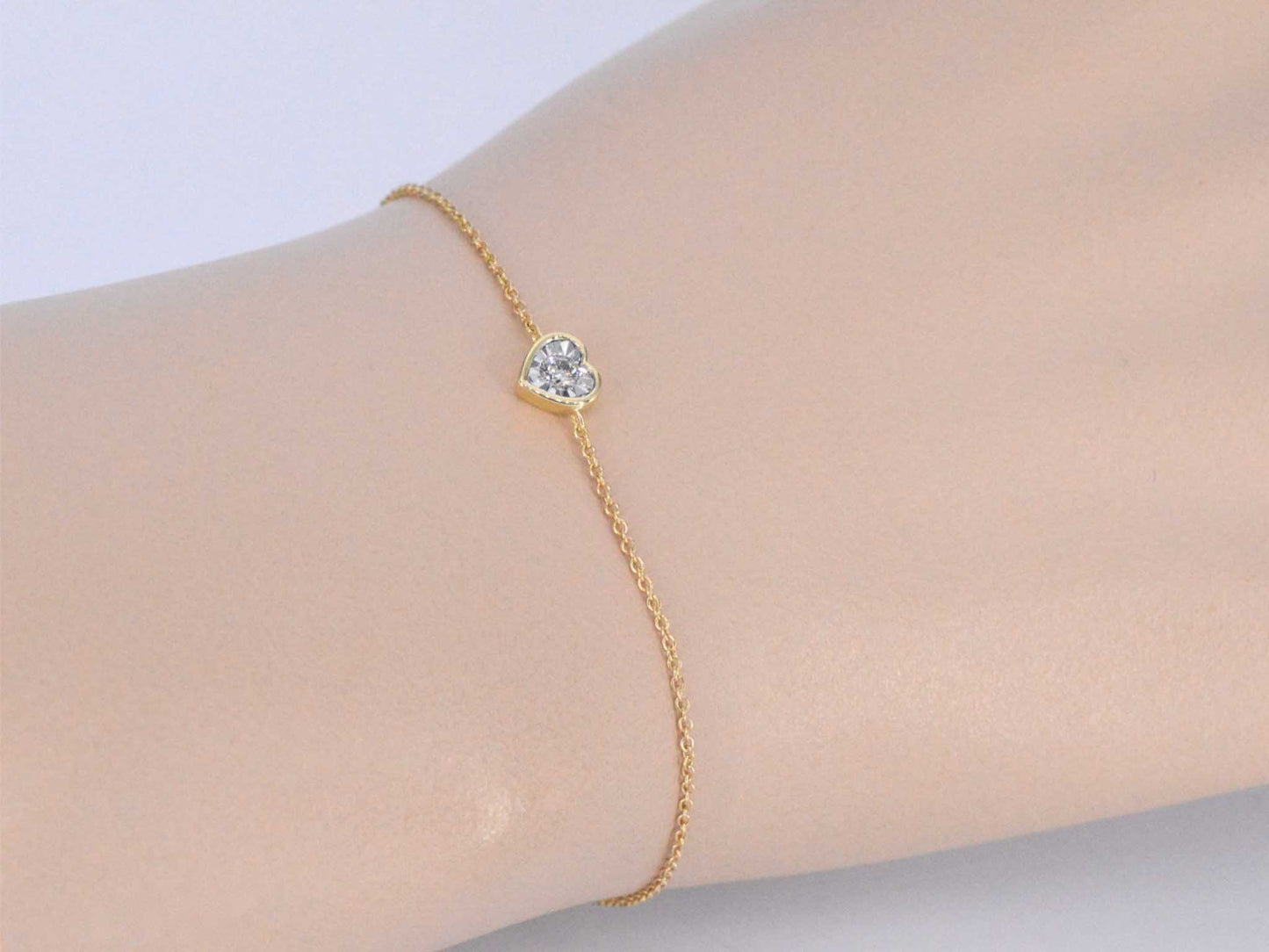 Gouden armband met diamanten hartje 0.10 carat