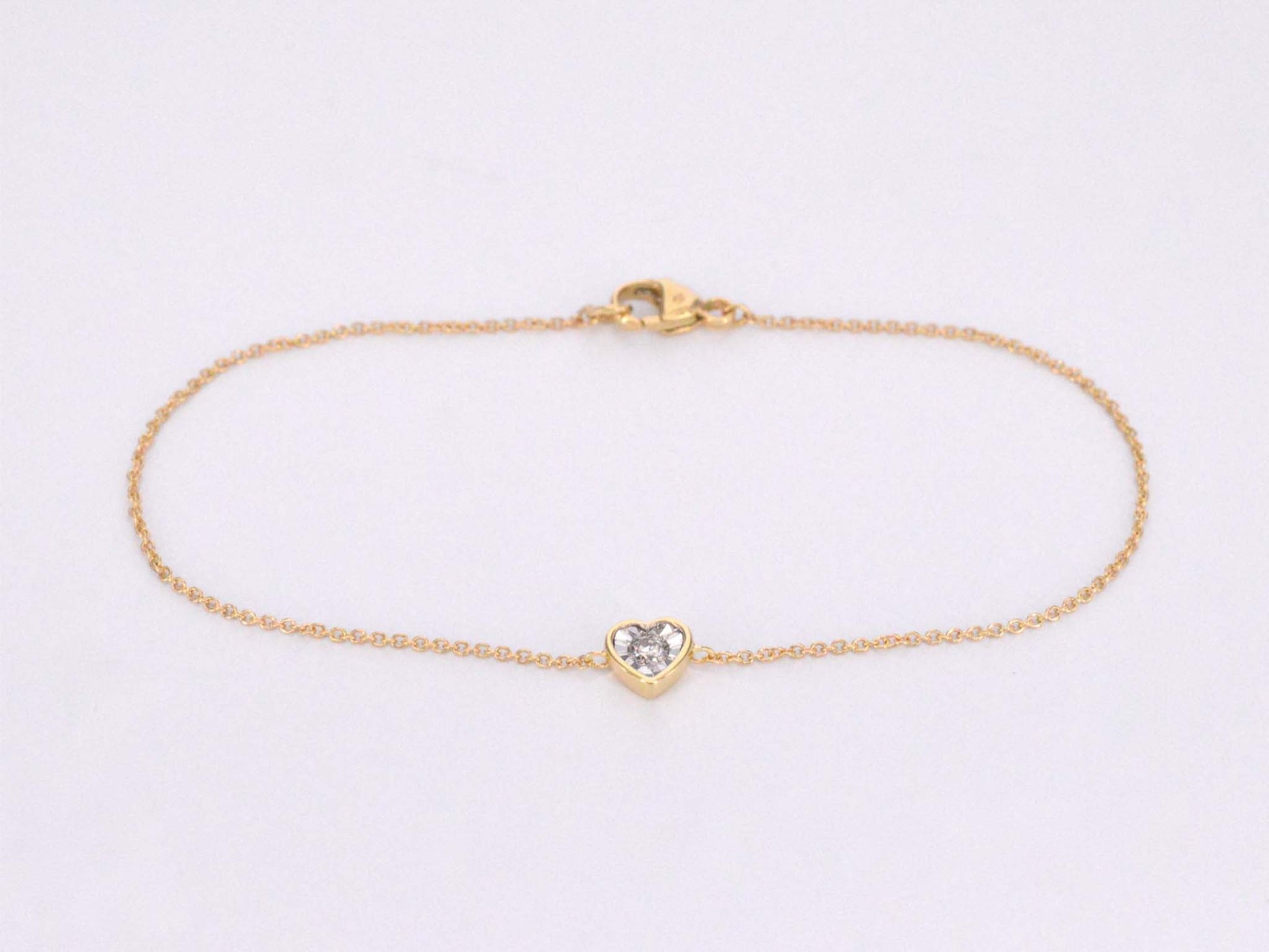 Gouden armband met diamanten hartje 0.10 carat