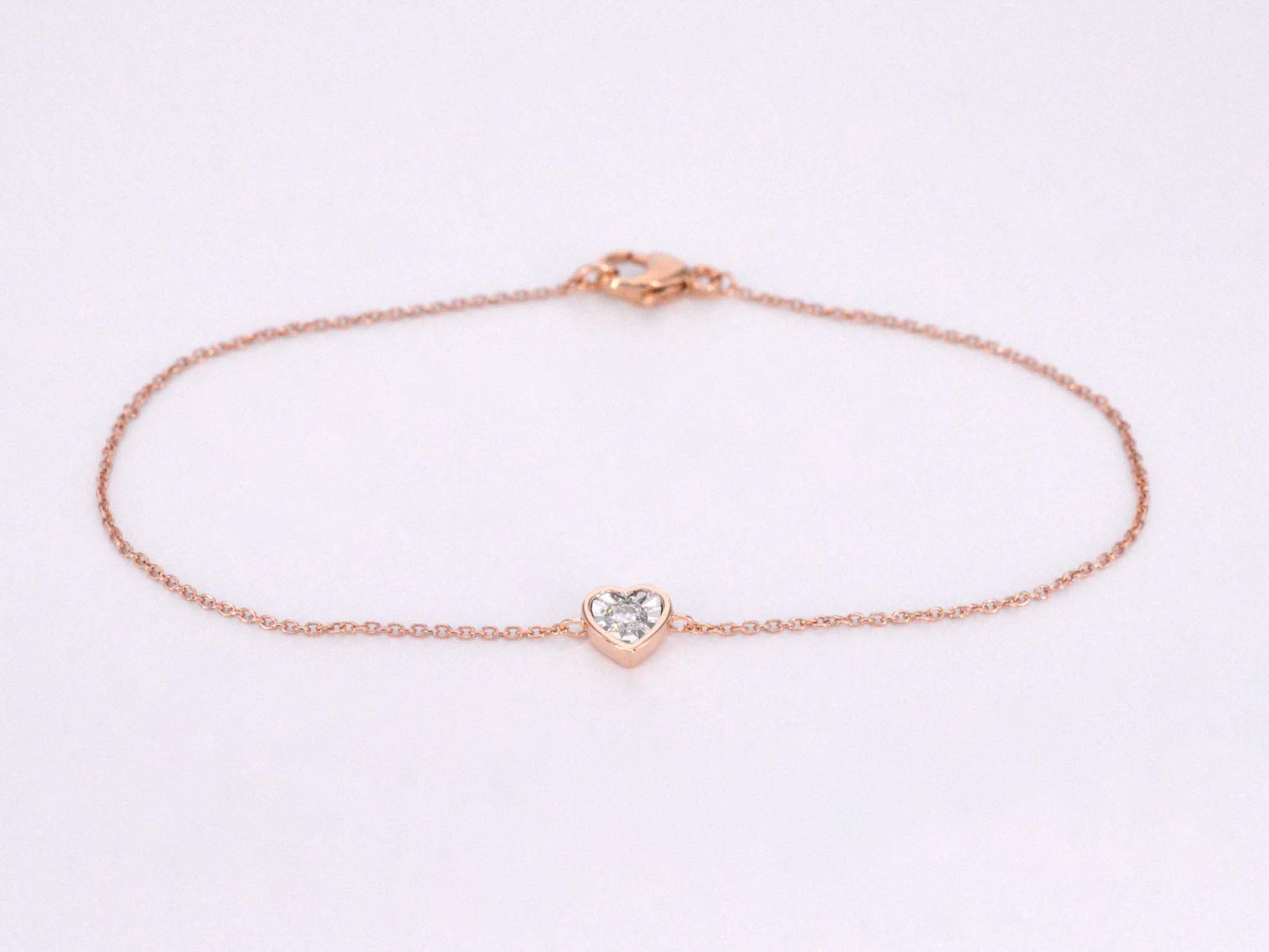 Rosegouden armband met diamanten hartje 0.10 carat