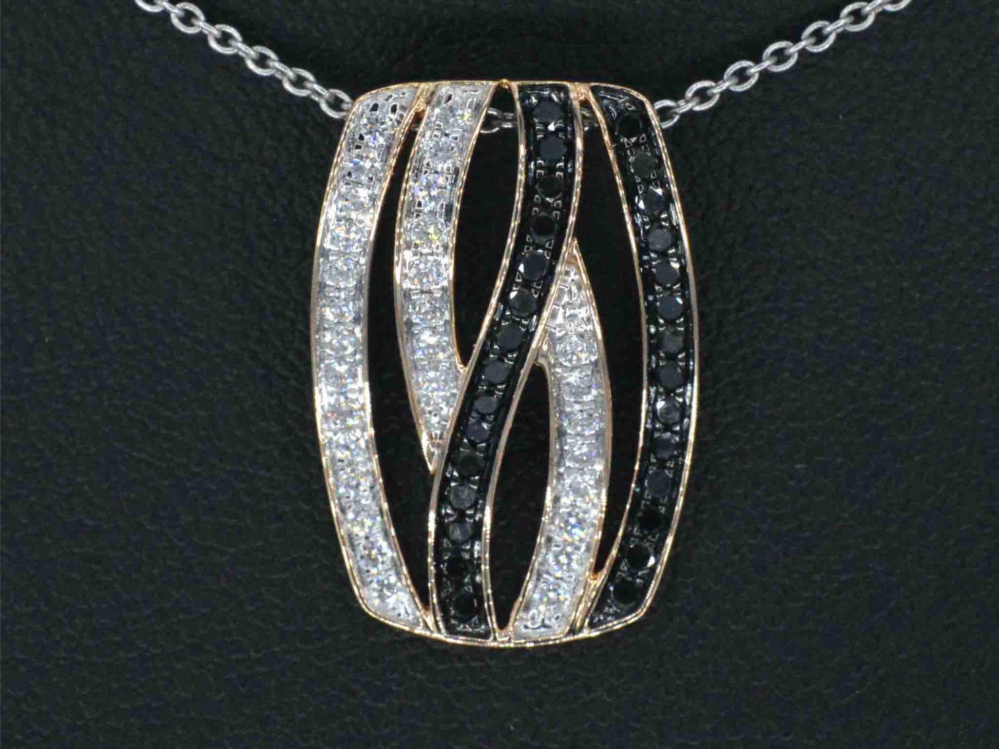 Rosegouden design hanger met witte en zwarte briljanten diamanten