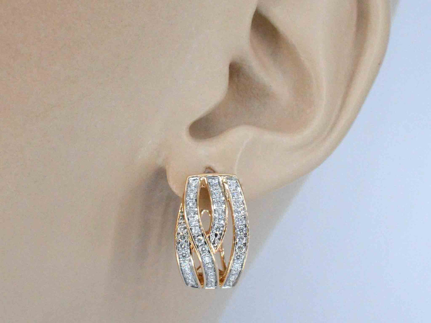 Rosegouden design oorbellen met briljanten diamanten