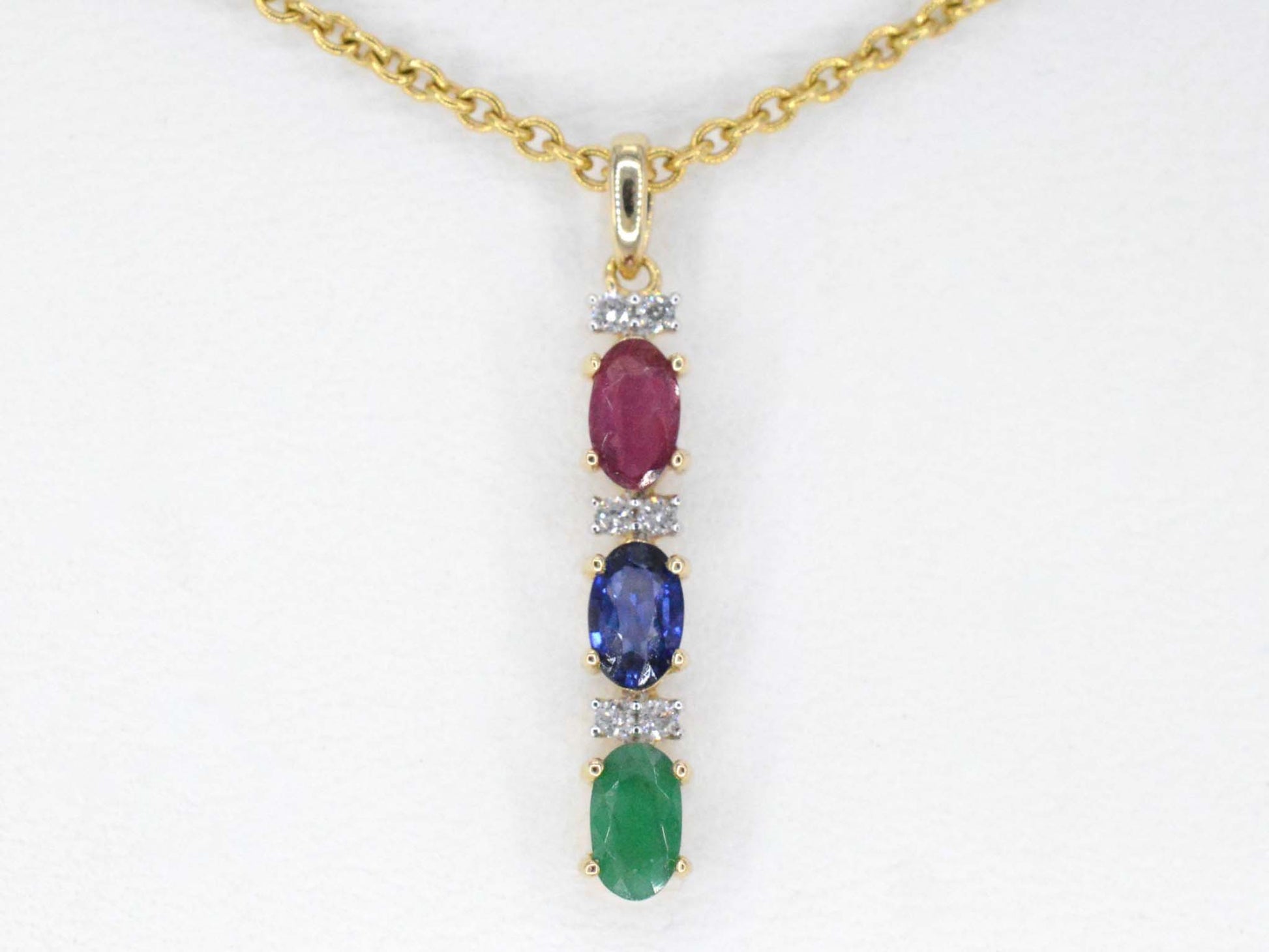 Gouden hanger met multicolour edelstenen en diamant