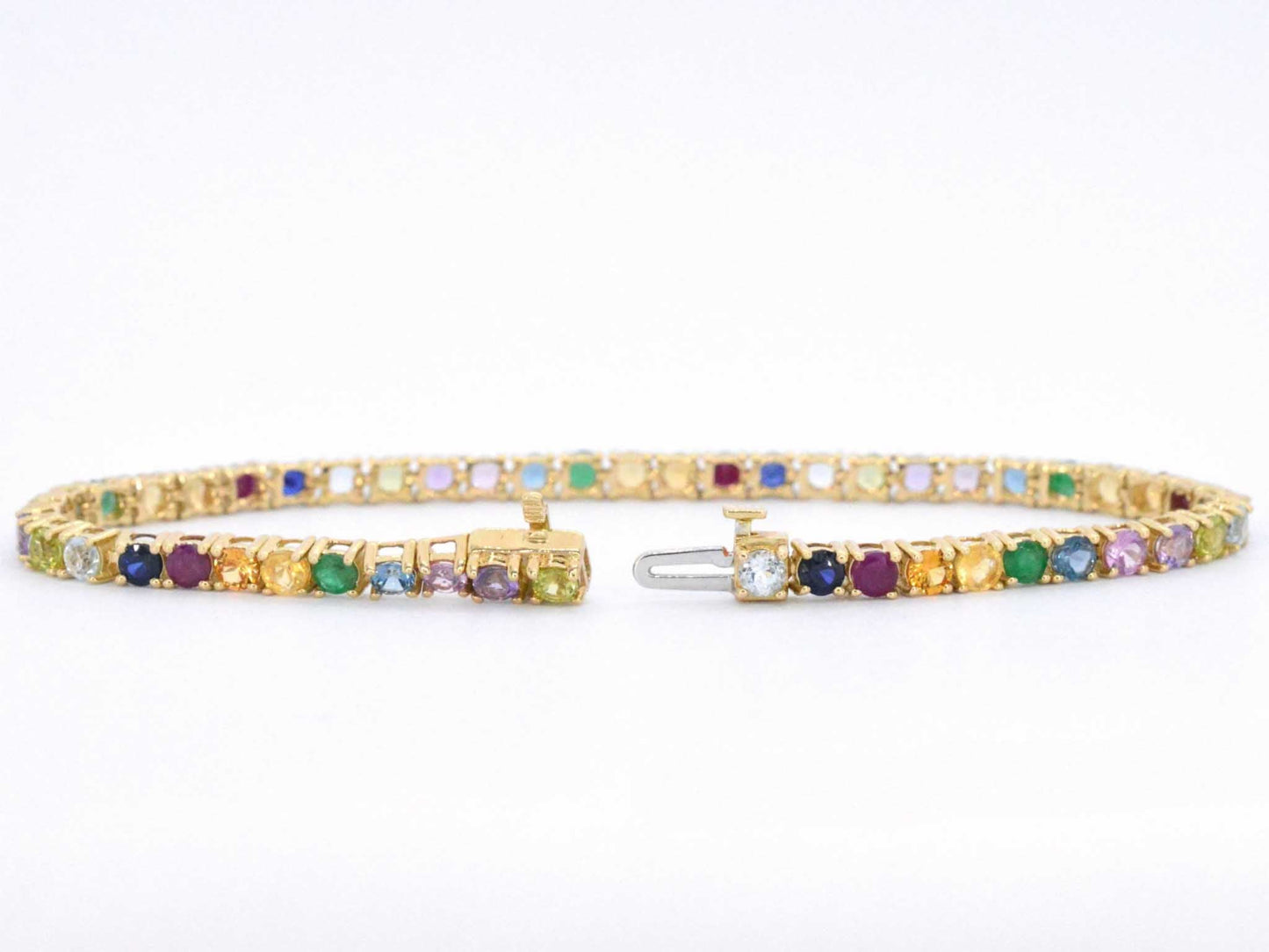 Geelgouden tennisarmband met multi colour edelstenen