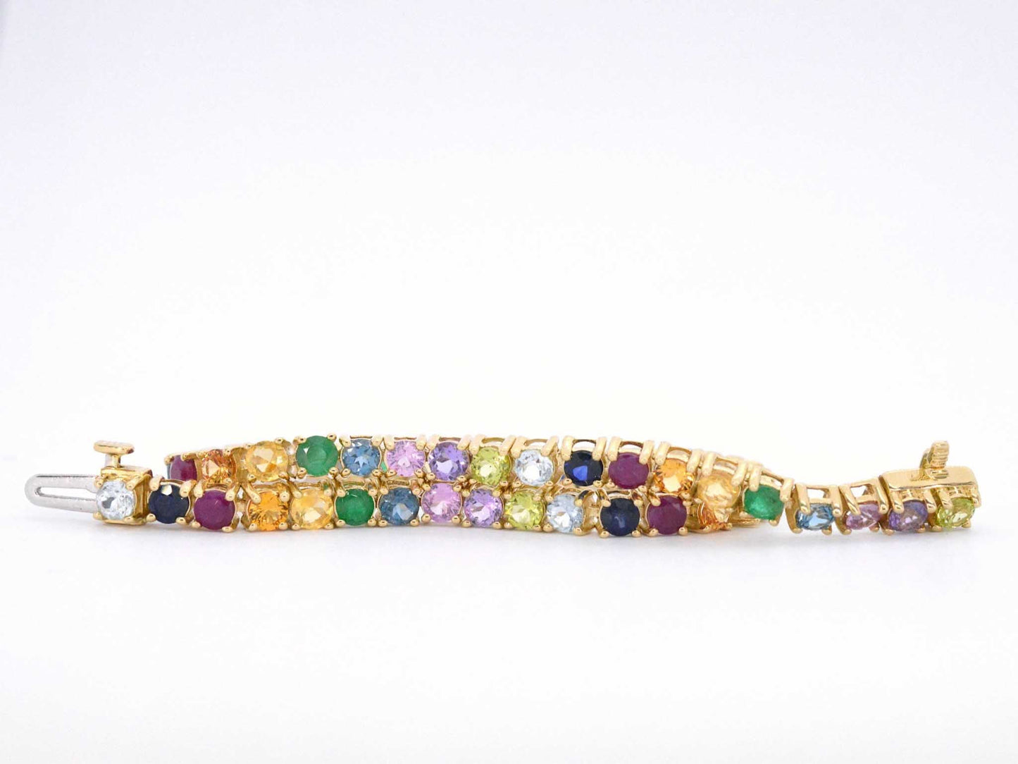 Geelgouden tennisarmband met multi colour edelstenen