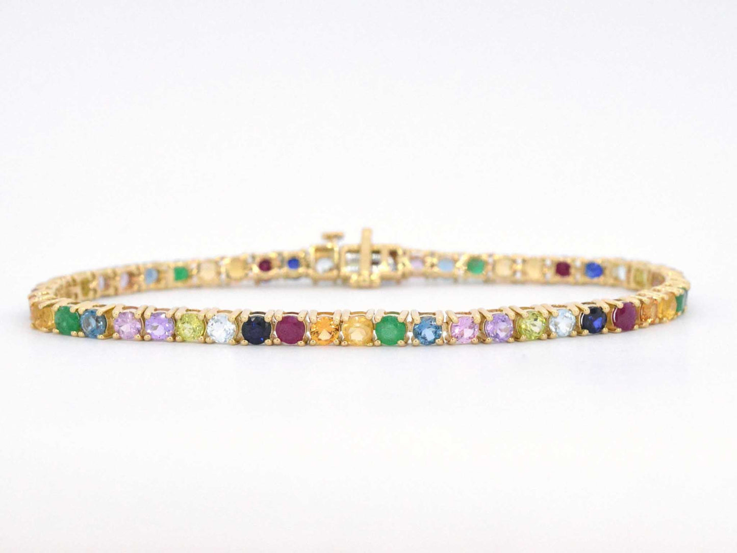 Geelgouden tennisarmband met multi colour edelstenen