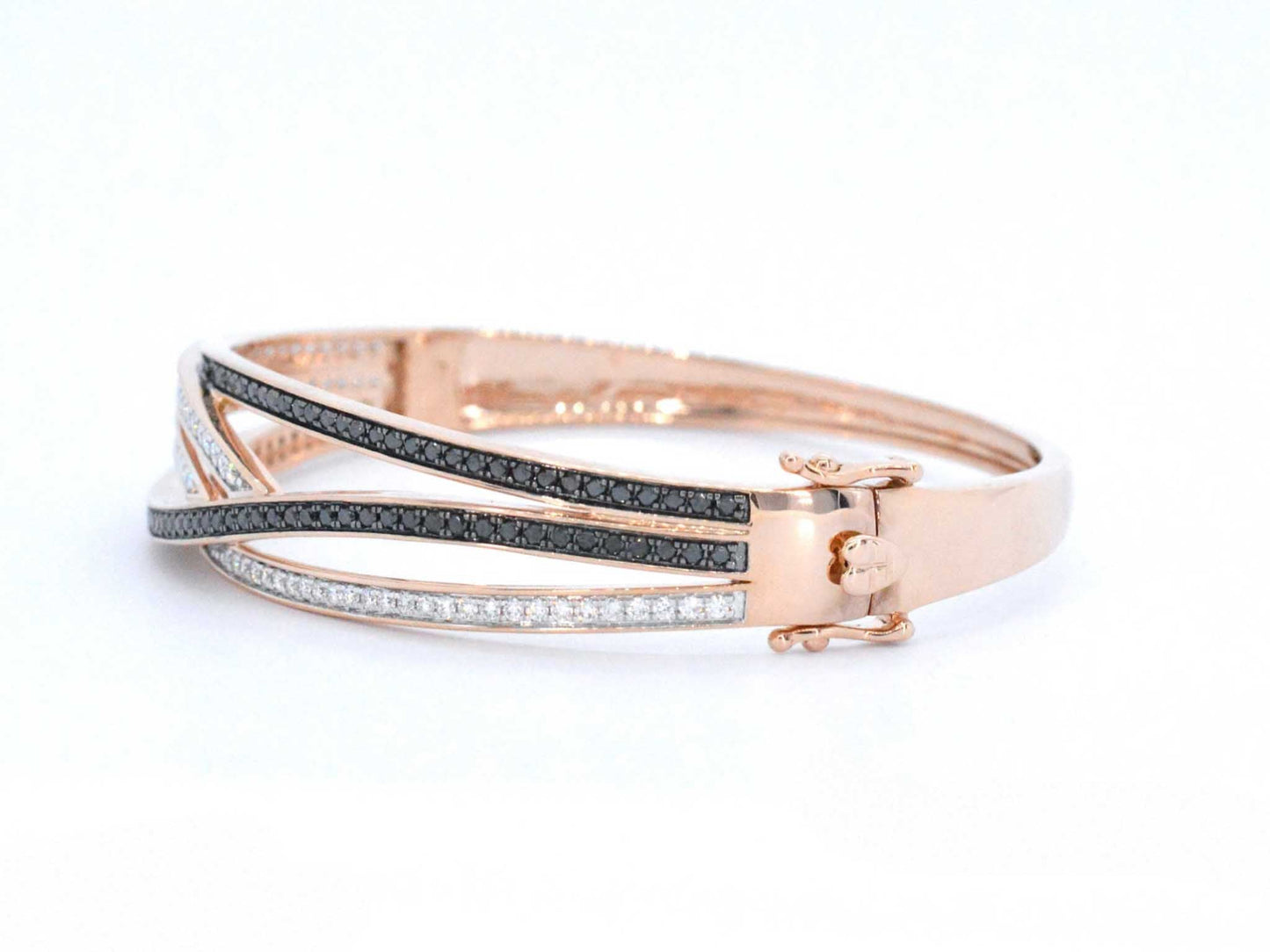 Rosegouden design armband met witte en zwarte briljanten diamanten