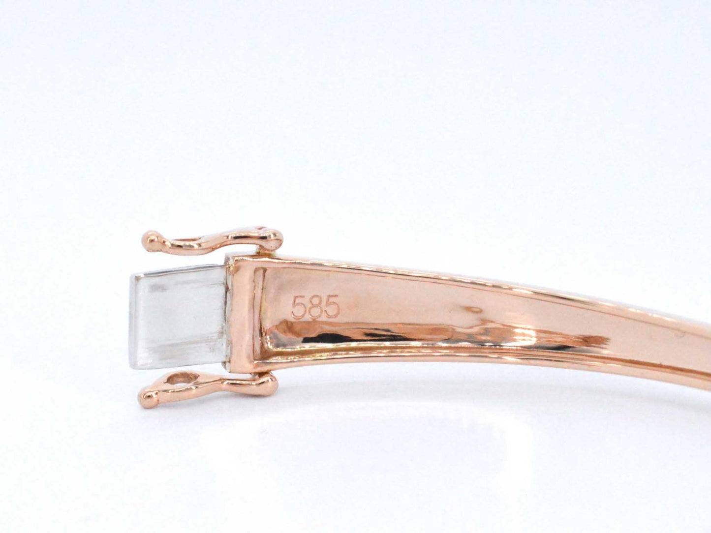 Rosegouden design armband met witte en zwarte briljanten diamanten