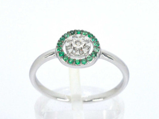 Witgouden ring met diamanten en smaragden