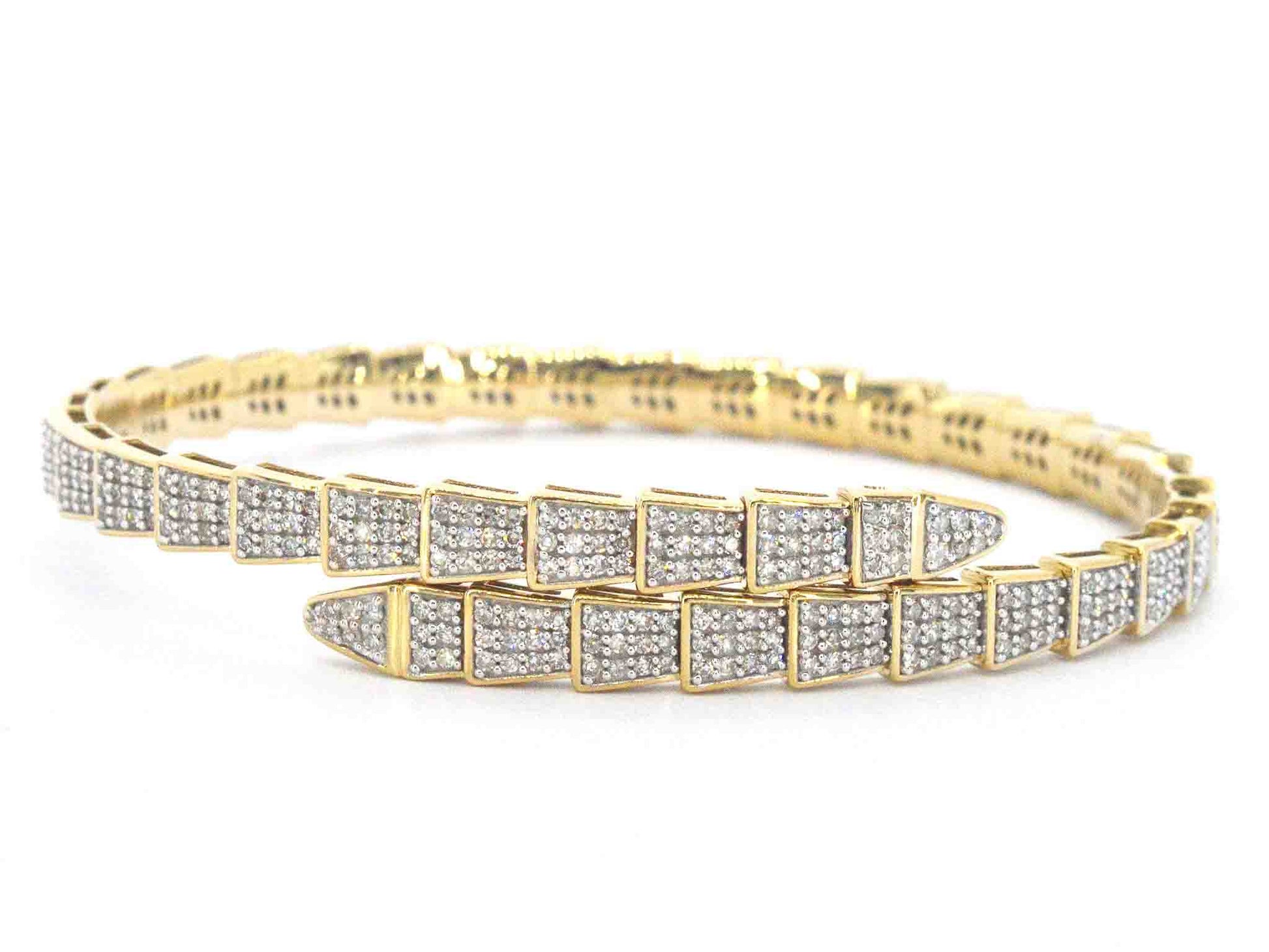 Geelgouden armband van slangen model met natuurlijke diamanten