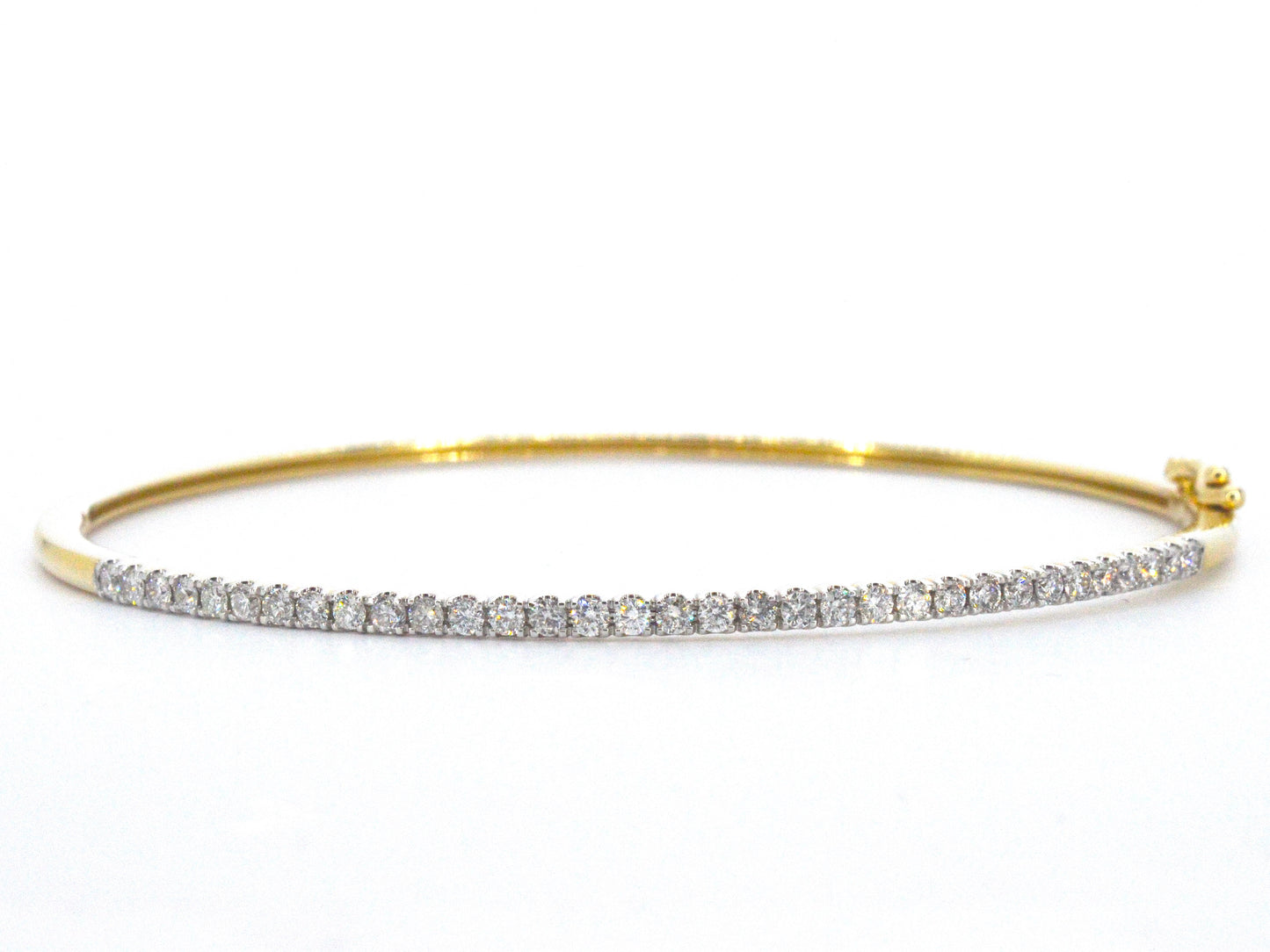 Gouden bangle armband met natuurlijke briljant geslepen diamanten
