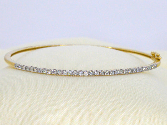 Gouden bangle armband met natuurlijke briljant geslepen diamanten