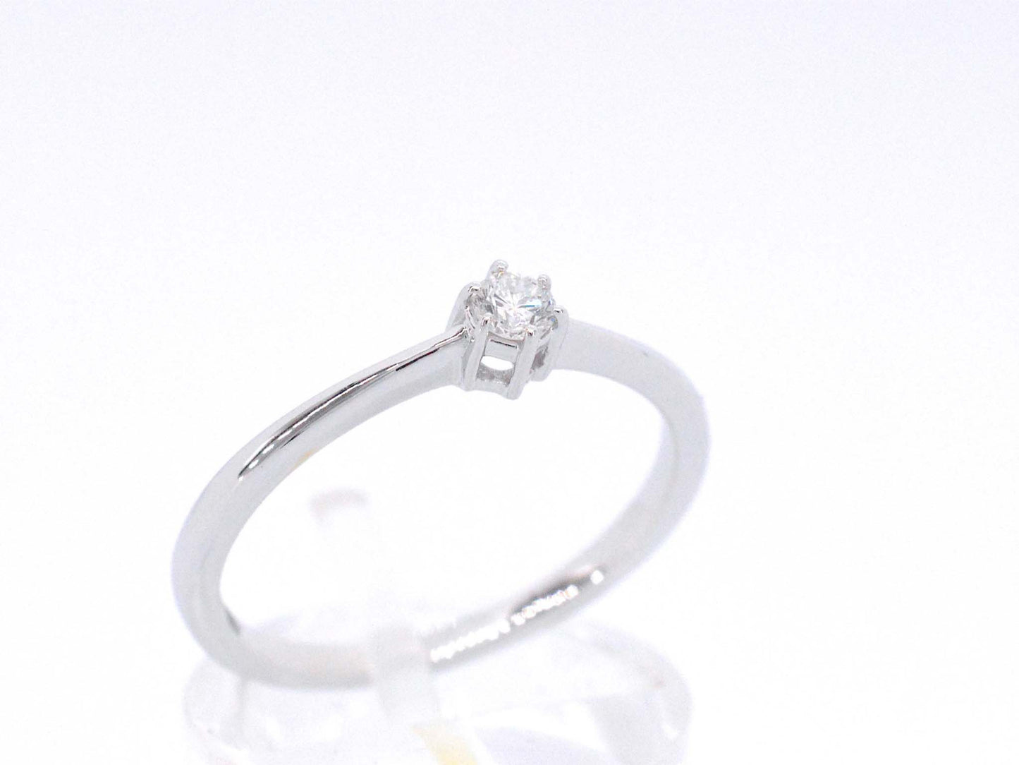 Witgouden ring solitaire met een briljant geslepen diamant 2502-2