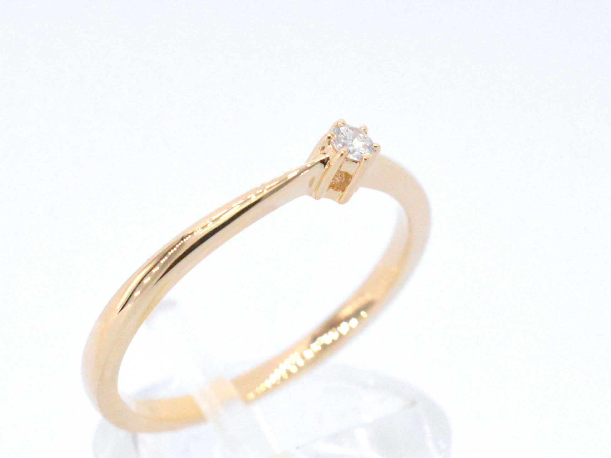 Gouden ring solitaire met een briljant geslepen diamant 2504-2