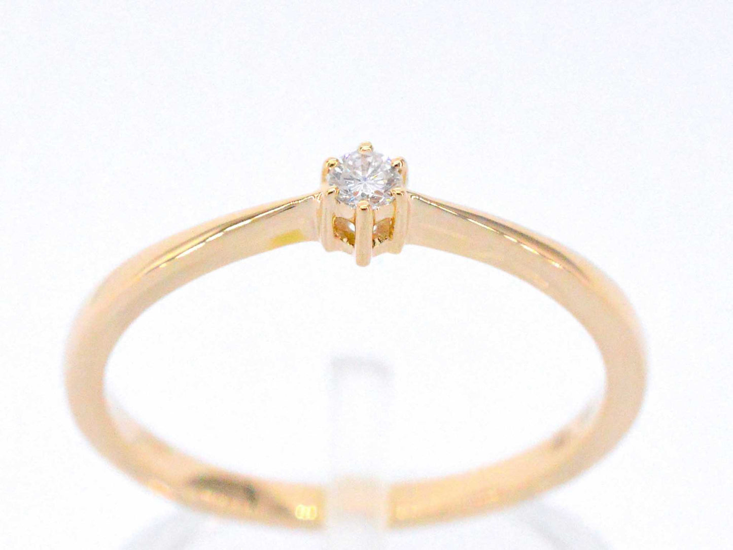 Gouden ring solitaire met een briljant geslepen diamant 2504-7