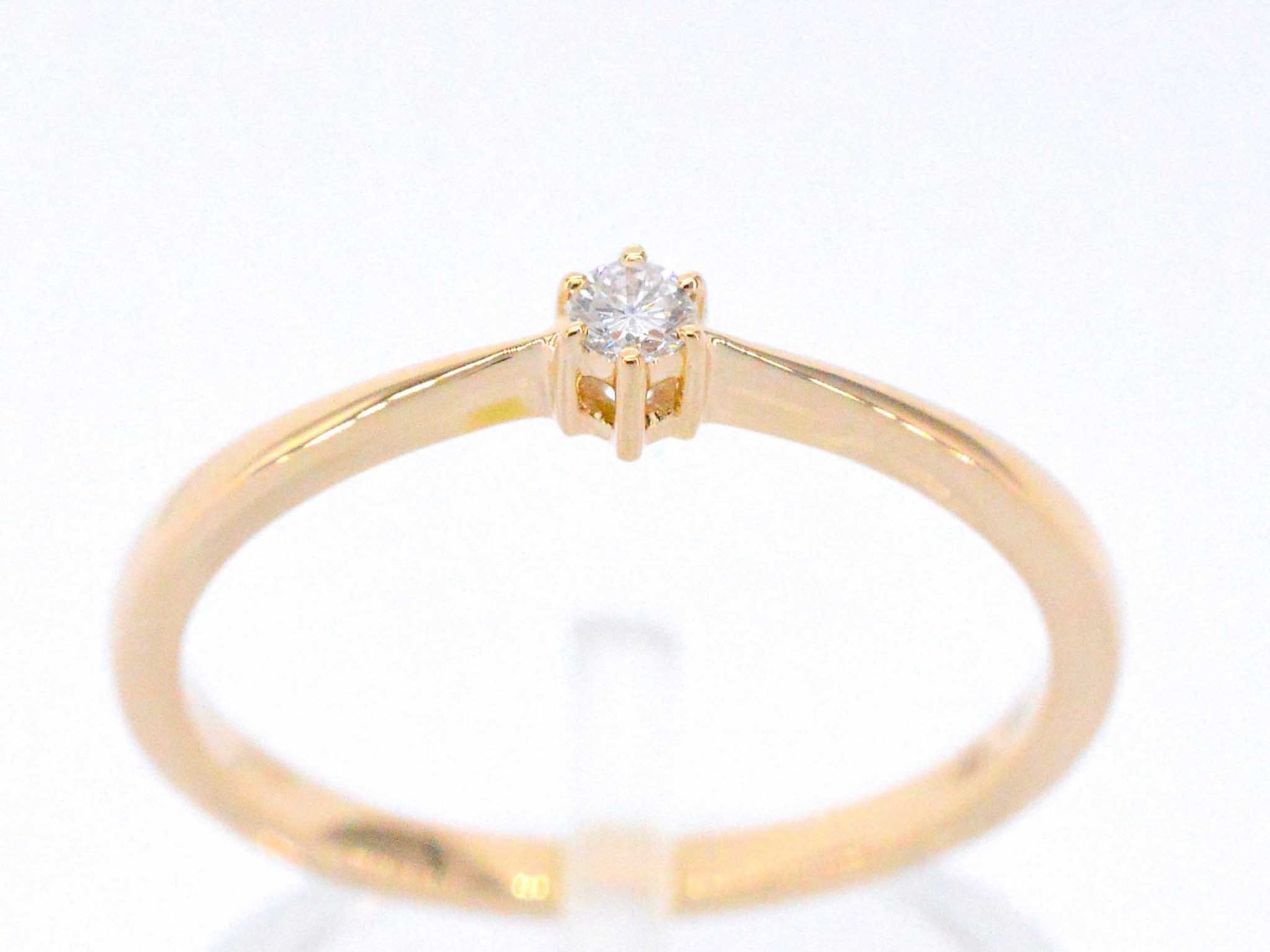 Gouden ring solitaire met een briljant geslepen diamant 2504-7