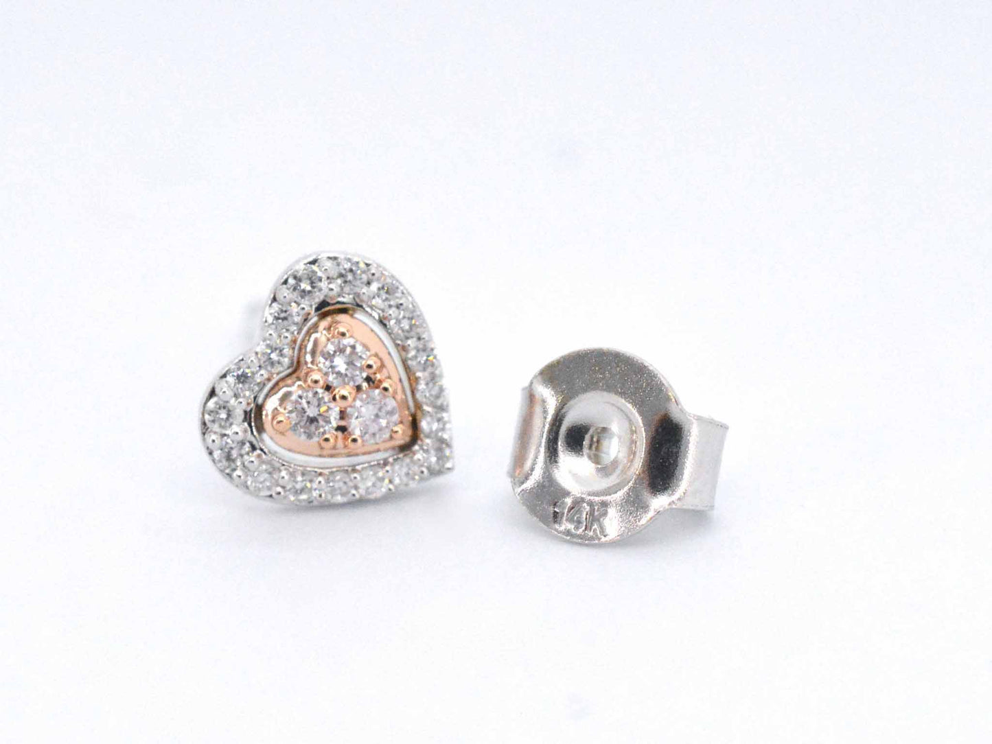 Witgouden hartvormige oorbellen met natuurlijke roze en witte diamant