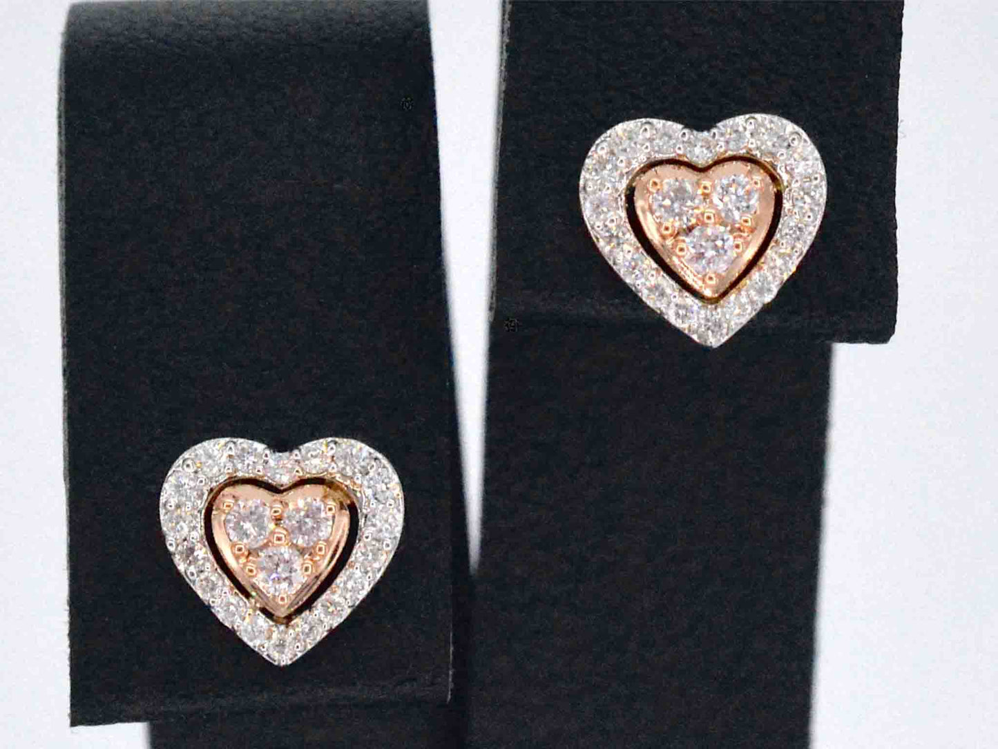 Witgouden hartvormige oorbellen met natuurlijke roze en witte diamant