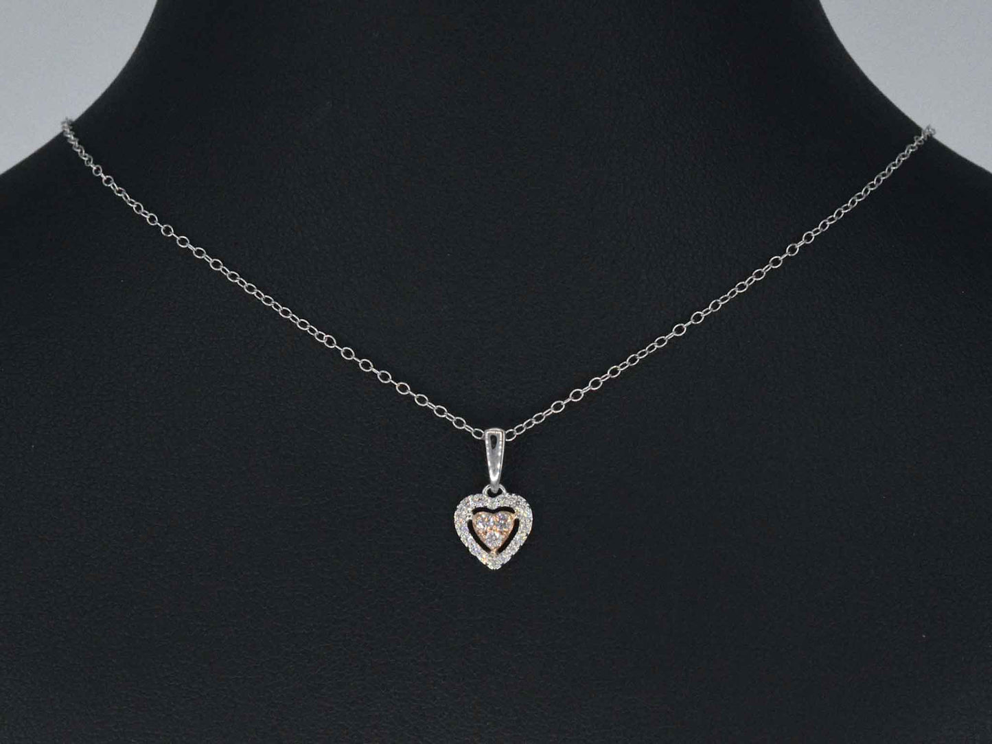 Witgouden hartvormige hanger met natuurlijke roze en witte diamant