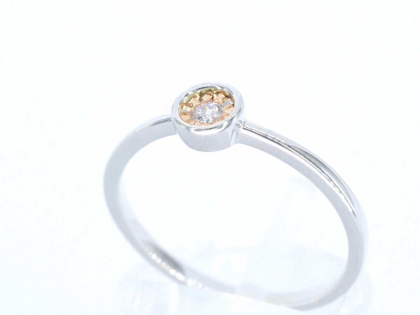 Witgouden ring met roze diamant