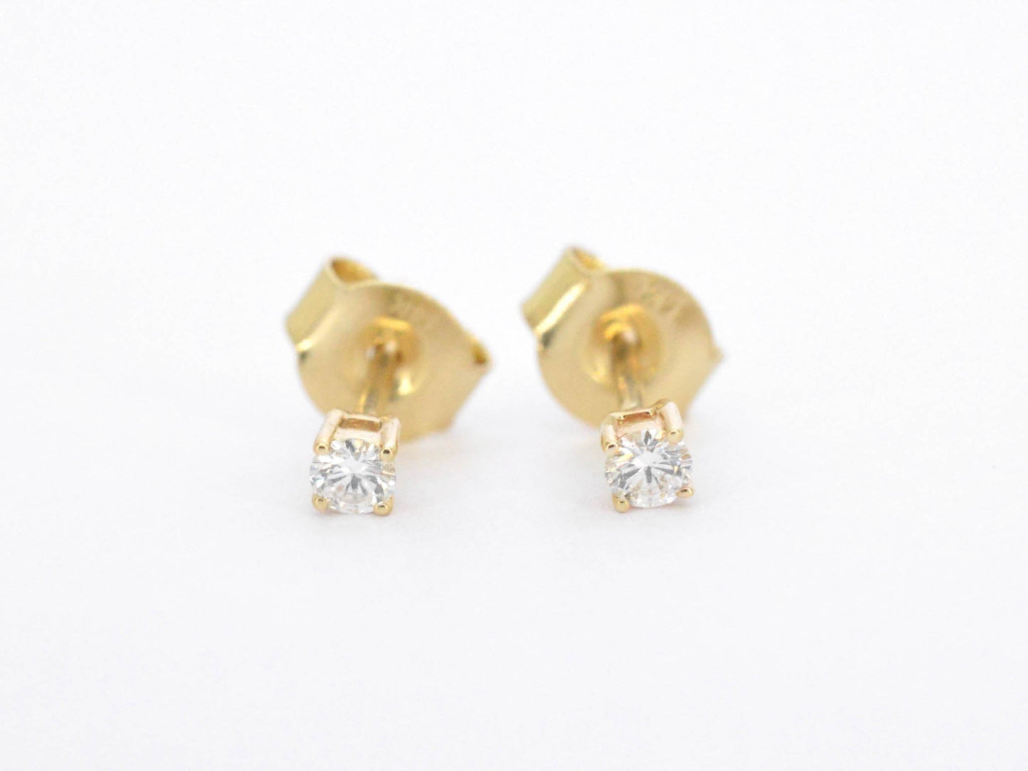 Gouden oorbellen met diamant