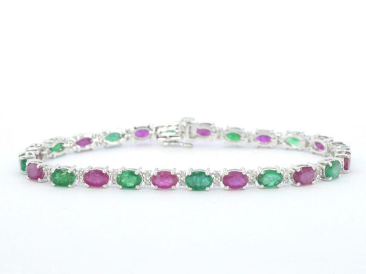 Witgouden tennisarmband met diamanten en smaragd en robijn