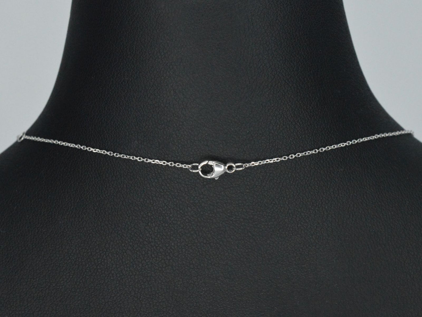 Witgouden collier met een rosegouden diamanten infinity hanger