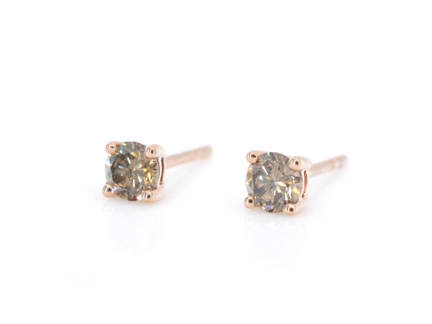 Rosegouden solitair oorbellen met cognac diamanten