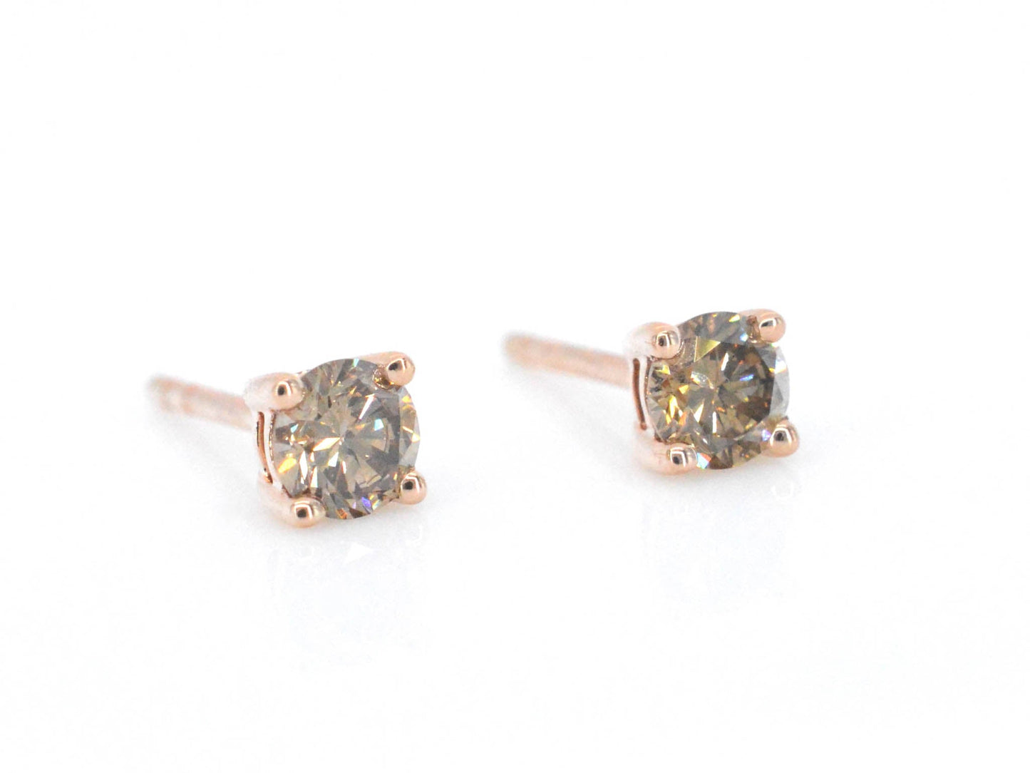 Rosegouden solitair oorbellen met champagne diamanten